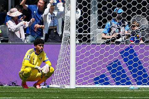 Qatar goalkeeper Mahmoud Abunada reacts after allowing Bosnia's Ermin Mahmic to score his side's third goal during the World Cup Group B soccer match in Seattle, Wednesday, June 24, 2026.