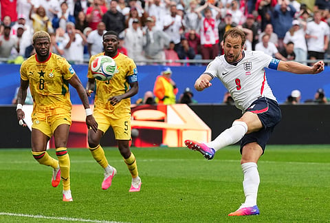 England's Harry Kane (9) tries a shot during the World Cup Group L soccer match between England and Ghana in Foxborough, Mass., near Boston.
