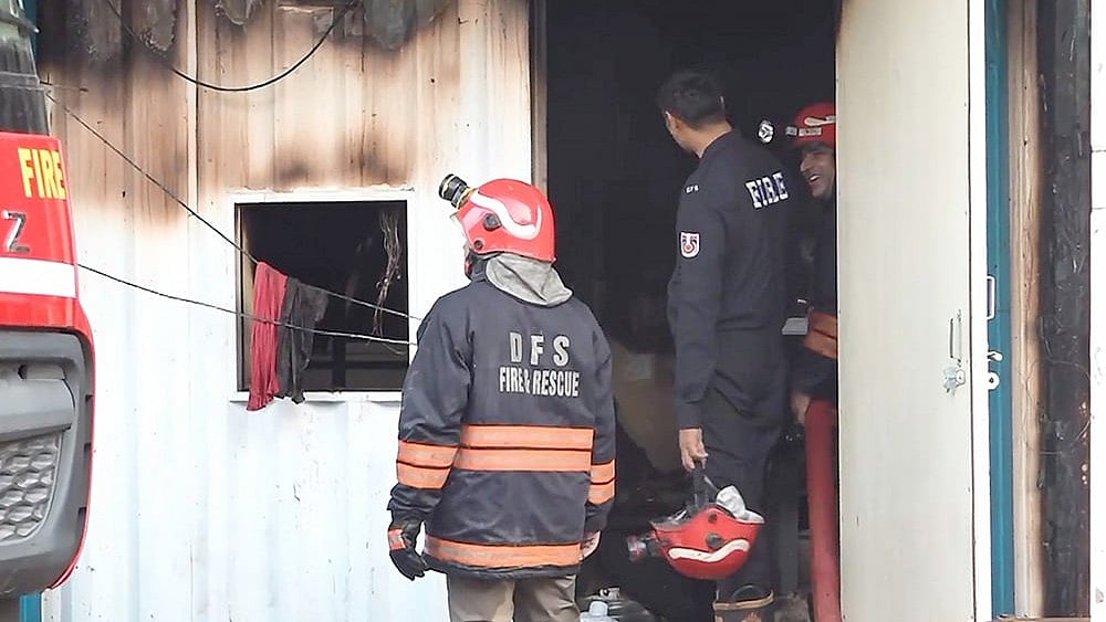Fire Destroys Nearly 200 Labour Sheds Near Udyog Bhawan Redevelopment Site - | Photo: PTI