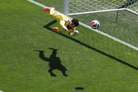Qatar goalkeeper Mahmoud Abunada (1) saves during the World Cup Group B soccer match between Bosnia and Qatar in Seattle, Wednesday, June 24, 2026.