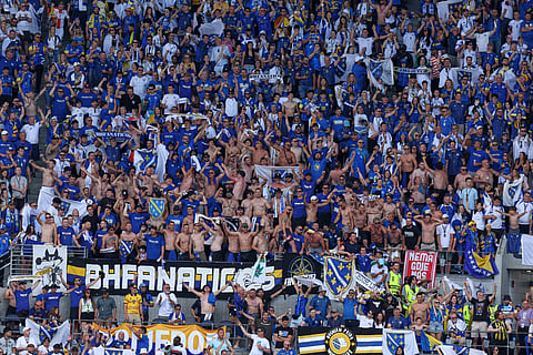 Bosnian fans celebrate after the World Cup Group B soccer match between Bosnia and Qatar in Seattle, Wednesday, June 24, 2026. 