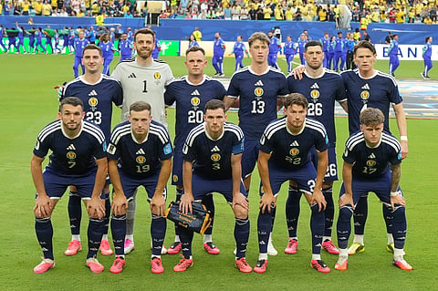 Scotland players pose for a team photo ahead of the World Cup Group C soccer match between Scotland and Brazil in Miami Gardens, Fla., Wednesday, June 24, 2026.