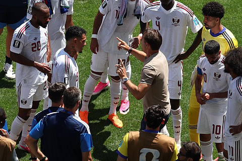 Qatar head coach Julen Lopetegui talks to his players during the World Cup Group B soccer match between Bosnia and Qatar in Seattle, Wednesday, June 24, 2026.