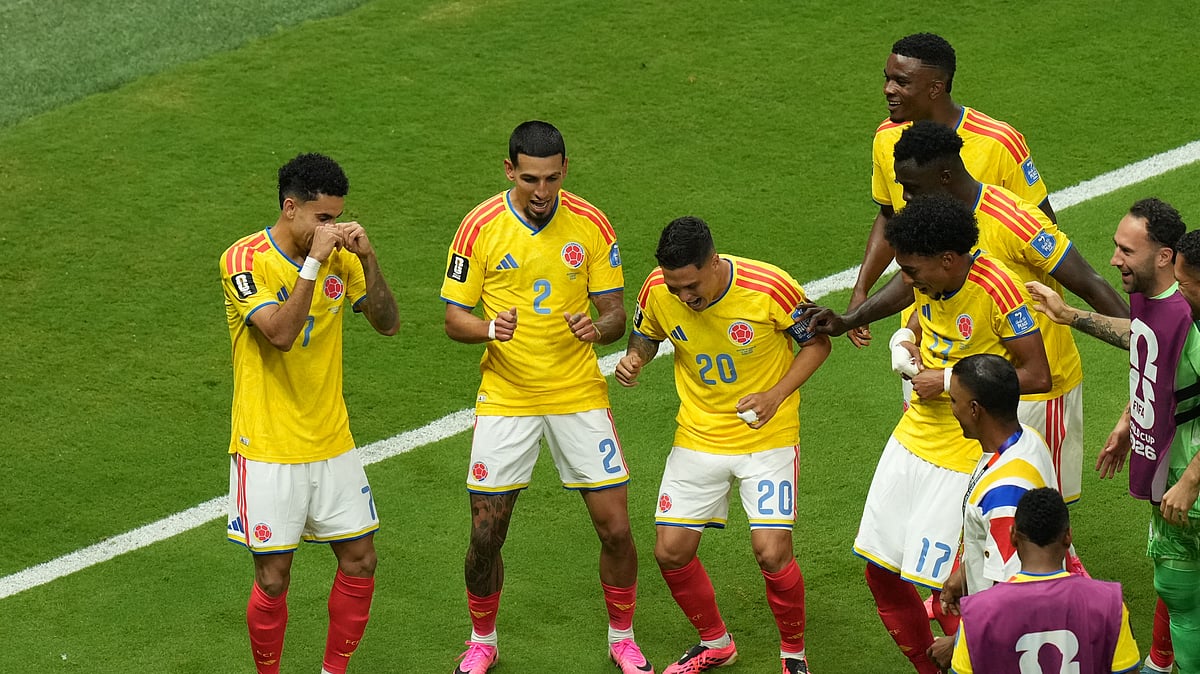 Colombia's Daniel Munoz (2) celebrates after scoring his side's opening goal with teammates during the World Cup Group K soccer match between Colombia and Congo in Zapopan, near Guadalajara, Mexico, Tuesday, June 23, 2026. - (AP Photo/Silvia Izquierdo)