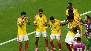 (AP Photo/Silvia Izquierdo) : Colombia's Daniel Munoz (2) celebrates after scoring his side's opening goal with teammates during the World Cup Group K soccer match between Colombia and Congo in Zapopan, near Guadalajara, Mexico, Tuesday, June 23, 2026.