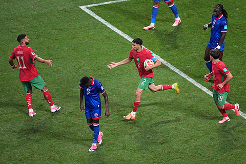 Morocco's Achraf Hakimi (2) celebrates their first goal with teammate Ismael Saibari (11) during the World Cup Group C soccer match between Morocco and Haiti in Atlanta, Wednesday, June 24, 2026.