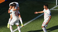 AP Photo/Mark Stockwell : Teammates congratulate Morocco's Ismael Saibari (11) after scoring his team's first goal during the World Cup Group C soccer match between Scotland and Morocco in Foxborough, Mass., near Boston, Friday, June 19, 2026.