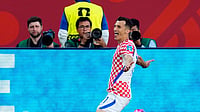 (Frank Gunn/The Canadian Press via AP) : Croatia's Ante Budimir (11) celebrates a goal against Panama during the second half of a World Cup Group L soccer match, in Toronto, on Tuesday, June 23, 2026.