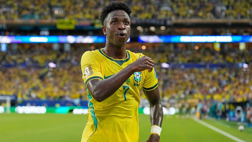 Brazil's Vinicius Junior (7) celebrates after scoring his team's second goal during the World Cup Group C soccer match between Scotland and Brazil in Miami Gardens - Rebecca Blackwell/AP Photo