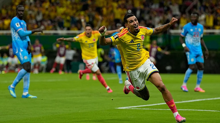 Colombia's Daniel Munoz celebrates after scoring his side's opening goal during the World Cup Group K soccer match between Colombia and Congo in Zapopan, near Guadalajara, Mexico, Tuesday, June 23, 2026. - (AP Photo/Ricardo Mazalan)