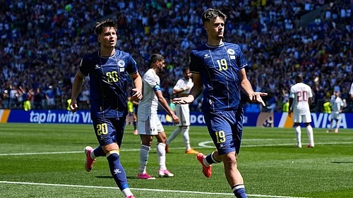 AP Photo/Lindsey Wasson : Bosnias Kerim Alajbegovic, right, celebrates after scoring his sides opening goal during the World Cup Group B soccer match against Qatar in Seattle.