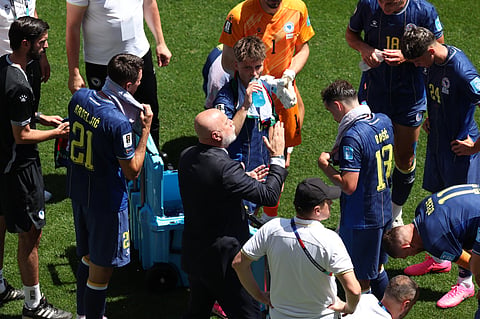 Bosnia head coach Serge Barbarezi talks to his players during the World Cup Group B soccer match between Bosnia and Qatar in Seattle, Wednesday, June 24, 2026.