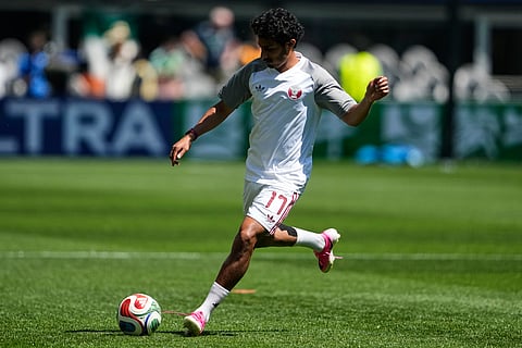 Qatar's Ahmed Alganehi warms up ahead of the World Cup Group B soccer match against Bosnia in Seattle, Wednesday, June 24, 2026.