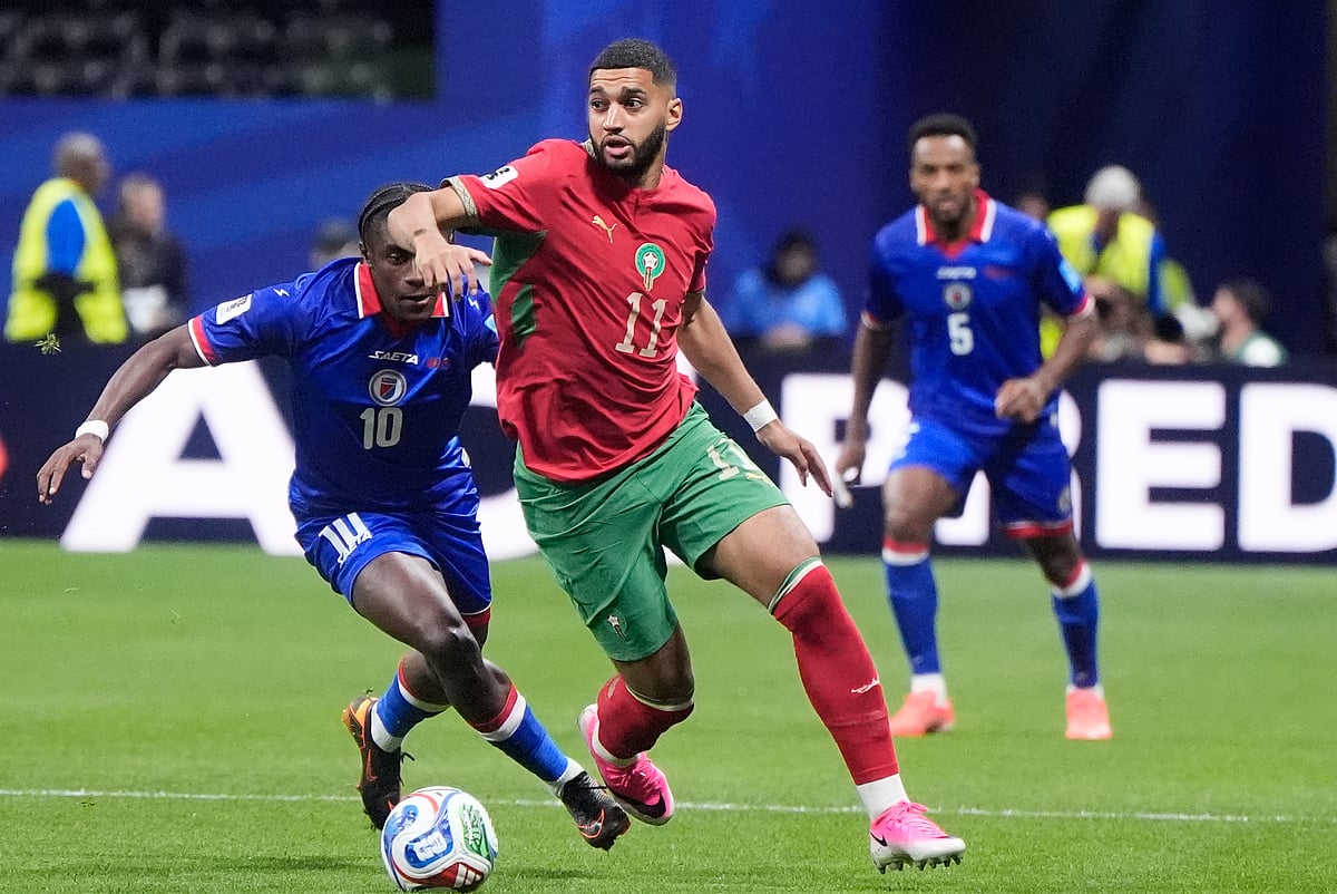 Morocco's Ismael Saibari (11) dribbles ahead of Haiti's Jean-Ricner Bellegarde (10) during the World Cup Group C soccer match between Morocco and Haiti in Atlanta, Wednesday, June 24, 2026. - (AP Photo/Mike Stewart)