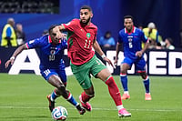 (AP Photo/Mike Stewart) : Morocco's Ismael Saibari (11) dribbles ahead of Haiti's Jean-Ricner Bellegarde (10) during the World Cup Group C soccer match between Morocco and Haiti in Atlanta, Wednesday, June 24, 2026.