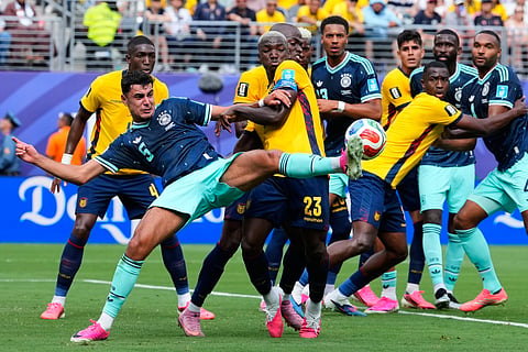 Germany's Aleksandar Pavlovic (5) and Ecuador's Moises Caicedo battle for the ball during the World Cup Group E soccer match in East Rutherford, N.J., near New York, Thursday, June 25, 2026.
