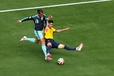 Ecuador's Piero Hincapie (3) and Germany's Leroy Sane (19) battle near the goal during the World Cup Group E soccer match in East Rutherford, N.J., near New York, Thursday, June 25, 2026.
