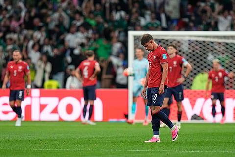 Czechia's Adam Hlozek (9) reacts after Mexico's Julian Quinones (16) scored their second goal during the World Cup Group A soccer match between Czechia and Mexico in Mexico City, Wednesday, June 24, 2026.