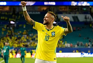 | Photo: AP/Lynne Sladky : Brazil's Neymar (10) celebrates after the World Cup Group C soccer match between Scotland and Brazil in Miami Gardens, Florida.
