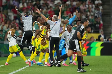 (AP Photo/Moises Castillo) : South Africa player celebrate at the end of the World Cup Group A soccer match between South Africa and South Korea in Guadalupe, near Monterrey, Mexico, Wednesday, June 24, 2026.