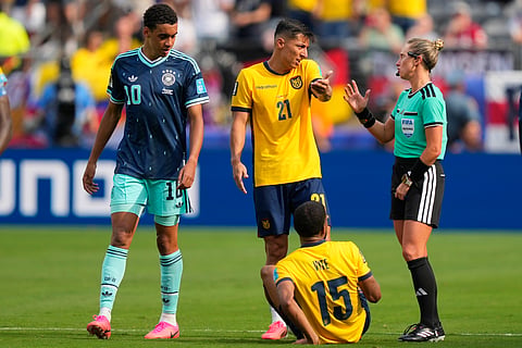 Referee Tori Penso of the United States talks to Ecuador's Alan Franco during the World Cup Group E soccer match between Germany and Ecuador in East Rutherford, N.J., near New York, Thursday, June 25, 2026.