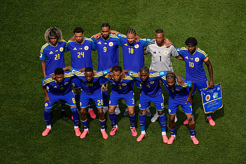 Curacao players pose for a photo ahead of the World Cup Group E soccer match between Curacao and Ivory Coast in Philadelphia, Thursday, June 25, 2026.