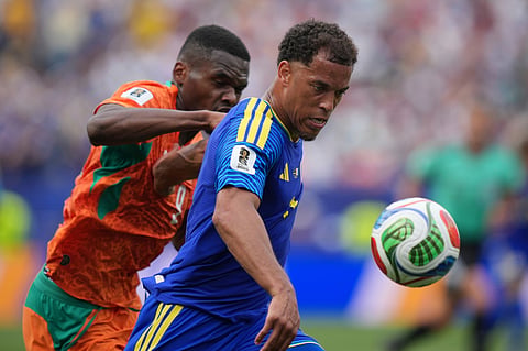Curaçao's Jurien Gaari (3), right, fights for the ball with Ivory Coast's Ange-Yoan Bonny (9) during the World Cup Group E soccer match between Curacao and Ivory Coast in Philadelphia, Thursday, June 25, 2026. 