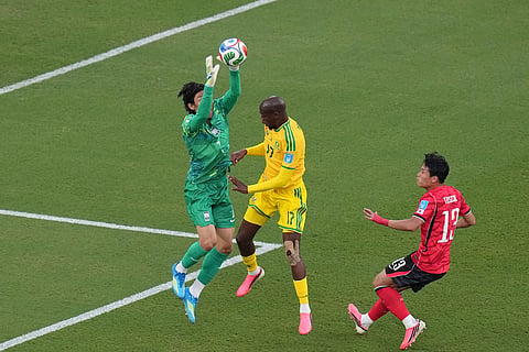 South Korea goalkeeper Kim Seung-gyu (1) stops the ball during the World Cup Group A soccer match between South Africa and South Korea in Guadalupe, near Monterrey, Mexico, Wednesday, June 24, 2026.