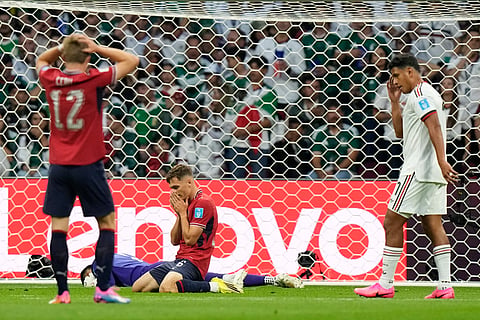 Czechia's Vladimir Coufal, kneeling, reacts after a missed shot on goal during the World Cup Group A soccer match between Czechia and Mexico in Mexico City, Wednesday, June 24, 2026.
