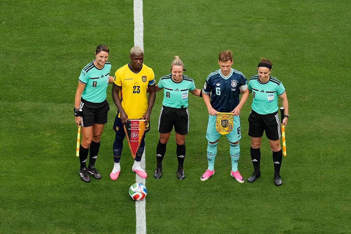 Ecuador vs Germany FIFA World Cup 2026 Group E refs with captains AP Photo