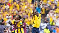 Frank Franklin II/AP Photo : Ecuador players celebrate at the end of the World Cup Group E soccer match between Ecuador and Germany in East Rutherford.
