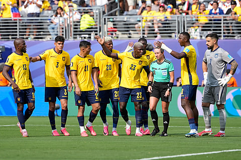Ecuador players protest to referee Tori Penso during the World Cup Group E soccer match between Ecuador and Germany in East Rutherford, N.J., near New York, Thursday, June 25, 2026.
