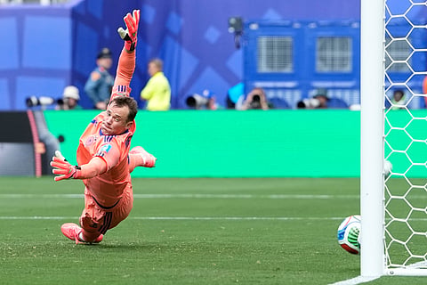 Germany goalkeeper Manuel Neuer fails to save a shot by Ecuador's Nilson Angulo to score this side's first goal during the World Cup Group E soccer match between Ecuador and Germany in East Rutherford, N.J., near New York, Thursday, June 25, 2026.