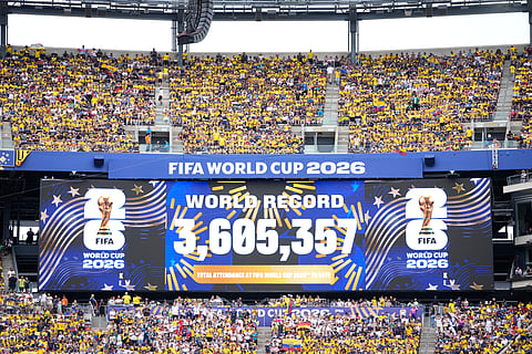 A screen displays the number of fans who attended every match during the World Cup Group E soccer match between Ecuador and Germany in East Rutherford, N.J., near New York, Thursday, June 25, 2026.
