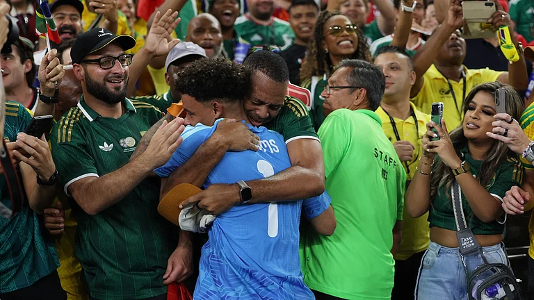 South Africa goalkeeper Ronwen Williams shares a celebratory moment with supporters after the Group A clash against South Korea in Guadalupe near Monterrey, Mexico, on June 24, 2026. - AP Photo/Sofia Yaker