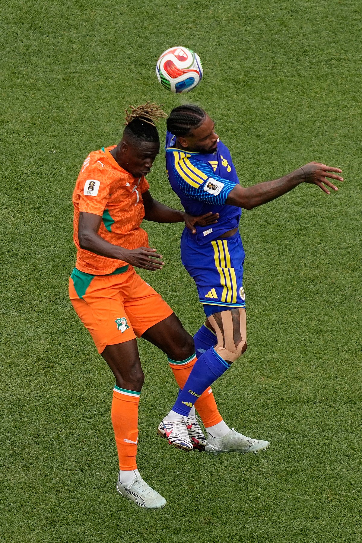 Curacao vs Ivory Coast FIFA World Cup 2026 Group E Odilon Kossounou and Juergen Locadia AP Photo