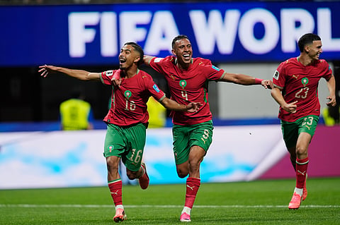 Morocco's Gessime Yassine, left, celebrates Soufiane Rahimi (9) and Bilal El Khannouss (23) after scoring their fourth goal during the World Cup Group C soccer match between Morocco and Haiti in Atlanta, Wednesday, June 24, 2026.