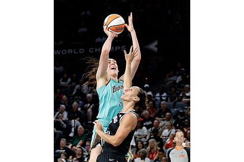 New York Liberty forward Breanna Stewart shoots over Las Vegas Aces forward Stephanie Talbot during the first half of an WNBA basketball game in Las Vegas.