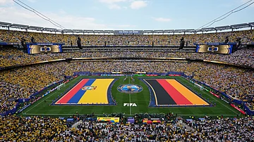 (AP Photo/Seth Wenig) : The flags of Ecuador, left, and Germany are unfurled on the field during ceremonies before the start of the World Cup Group E soccer match in East Rutherford, N.J., near New York, Thursday, June 25, 2026.