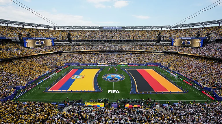 The flags of Ecuador, left, and Germany are unfurled on the field during ceremonies before the start of the World Cup Group E soccer match in East Rutherford, N.J., near New York, Thursday, June 25, 2026. - (AP Photo/Seth Wenig)
