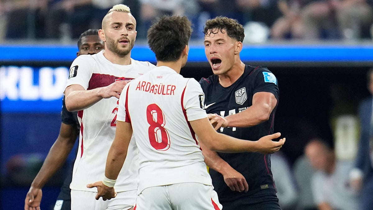 United States' Sebastian Berhalter (14) and Turkey's Arda Guler (8) react during the World Cup Group D soccer match between Turkey and the United States in Inglewood, Calif., near Los Angeles, Thursday, June 25, 2026. - (AP Photo/Gregory Bull)