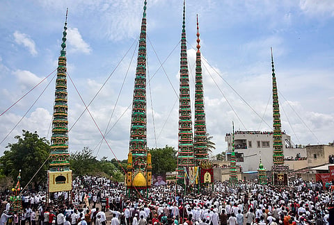People take part in a 'Tazia' procession on the occasion of Muharram, at Kadegaon village, in Sangli, Maharashtra.