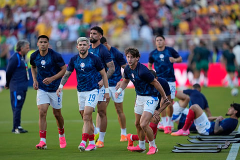 Paraguay players warm up ahead of the World Cup Group D soccer match between Paraguay and Australia in Santa Clara, Calif., near San Francisco, Thursday, June 25, 2026