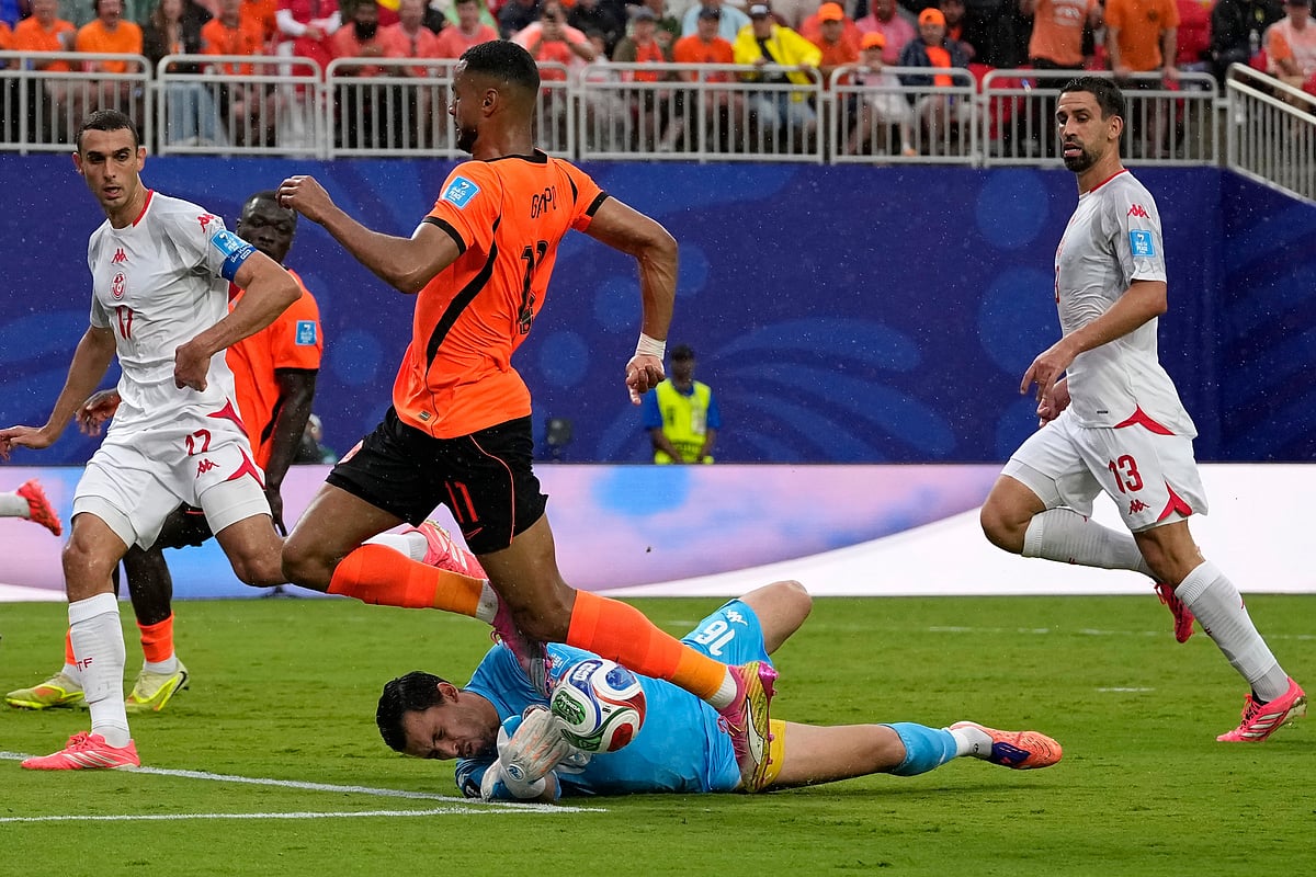 Tunisia vs Netherlands FIFA World Cup 2026 Group F Aymen Dahmen and Cody Gakpo AP Photo