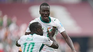 (AP Photo/Stephanie Scarbrough) : Senegal's Pape Gueye, right, and Sadio Mane (10) celebrate their third goal during the World Cup Group I soccer match between Senegal and Iraq in Toronto, Friday, June 26, 2026.