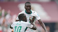 (AP Photo/Stephanie Scarbrough) : Senegal's Pape Gueye, right, and Sadio Mane (10) celebrate their third goal during the World Cup Group I soccer match between Senegal and Iraq in Toronto, Friday, June 26, 2026.