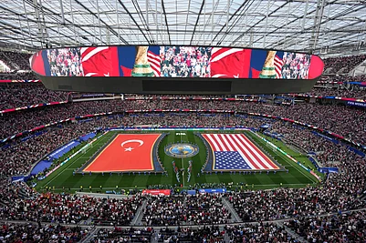 (AP Photo/Marcio J. Sanchez) : The United States and Turkey players walk on the pitch prior to a World Cup Group D soccer match in Inglewood, Calif., near Los Angeles, Thursday, June 25, 2026.