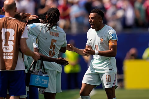 France's Kylian Mbappe (10) celebrates his team's second goal during the World Cup Group I soccer match
