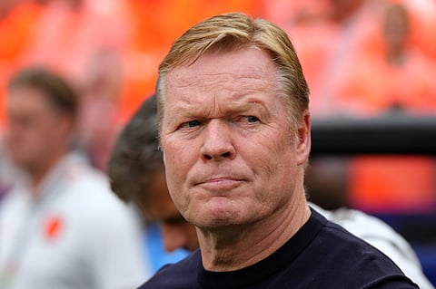 Netherlands head coach Ronald Koeman stands by the bench before the World Cup Group F soccer match between Tunisia and the Netherlands in Kansas City, Mo., Thursday, June 25, 2026.