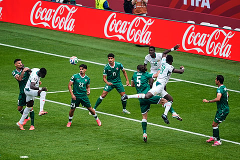 Senegal's Abdoulaye Seck, second from lefdt, scores their first goal during the World Cup Group I soccer match between Senegal and Iraq in Toronto, Friday, June 26, 2026.